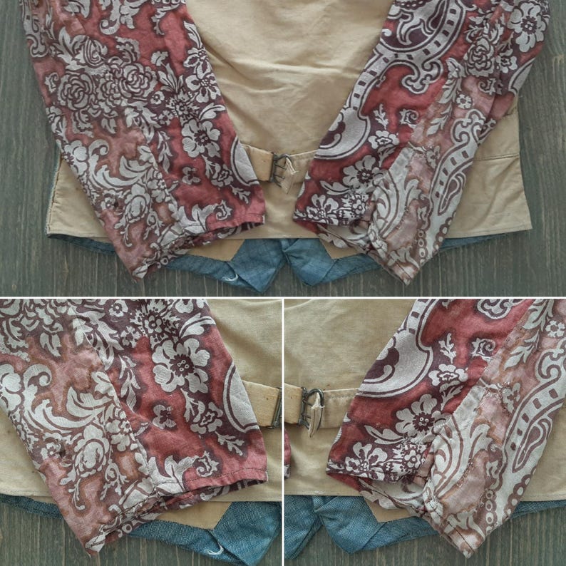 May include: Close-up of the sleeves of a beige jacket with a floral pattern. The sleeves are made of a sheer fabric with a red and white floral pattern. The jacket has a brown leather belt with a metal buckle.