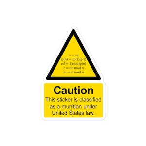May include: A yellow and black sticker featuring mathematical formulas and the word "Caution". The text on the sticker reads: "This sticker is classified as a munition under United States law."