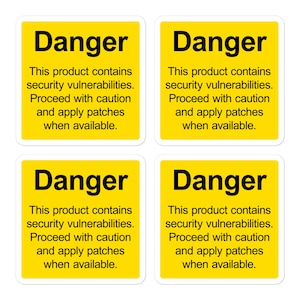 Op de afbeelding: Vier gele vierkante waarschuwingsborden met zwarte tekst die "Gevaar" en "Dit product bevat beveiligingslekken. Ga voorzichtig te werk en pas patches toe wanneer beschikbaar." luidt.