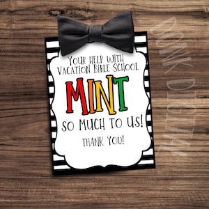May include: A black and white striped card with a bow tie at the top. The card says "Your help with Vacation Bible School MINT so much to us! Thank you!"