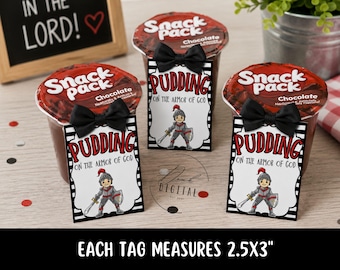 May include: Three chocolate pudding snack cups with black bow ties and tags that read "Pudding on the Armor of God." Each tag features a cartoon knight. The text "Each tag measures 2.5x3" is at the bottom.