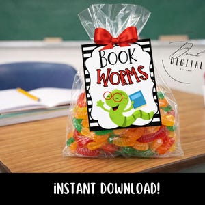 May include: A clear cellophane bag filled with colorful gummy worms, tied with a red bow. A tag with the words "BOOK WORMS" and a cartoon worm wearing glasses and holding a book is attached to the bag. The words "INSTANT DOWNLOAD!" are at the bottom.
