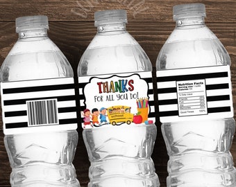 May include: Three water bottles with black and white striped labels. The center label has a cartoon school bus and children with the text "THANKS FOR ALL YOU DO!" The right label has a nutrition facts label with the text "Friends, Fun, Memories, Good Times".