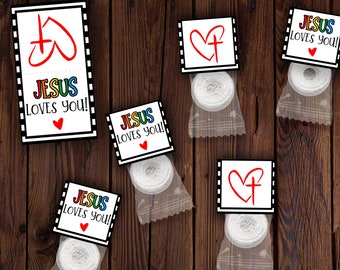 May include: Five small gift bags with white mints inside. Each bag has a different design with a red heart and the words "Jesus Loves You!" in colorful letters.