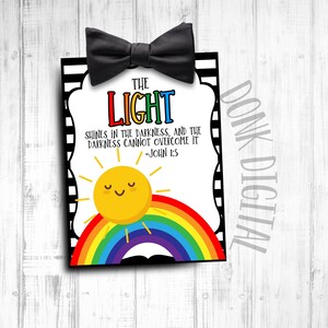 May include: A printable digital download with a black and white striped background, a black bow tie, a yellow sun with a rainbow, and the text "THE LIGHT SHINES IN THE DARKNESS, AND THE DARKNESS CANNOT OVERCOME IT -JOHN 1:5".