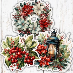 May include: Three Christmas-themed stickers featuring a wreath with red and white flowers, a lantern with red berries and a poinsettia, and a holly sprig with red berries.