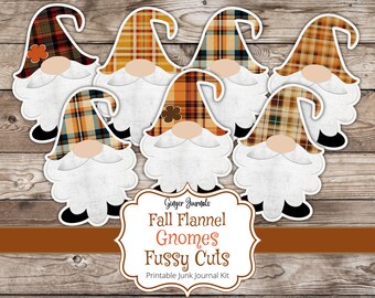 May include: Seven printable gnome cutouts with fall flannel patterns in orange, brown, and red. The gnomes have white beards and black shoes. The text "Fall Flannel Gnomes Fussy Cuts Printable Junk Journal Kit" is at the bottom of the image.