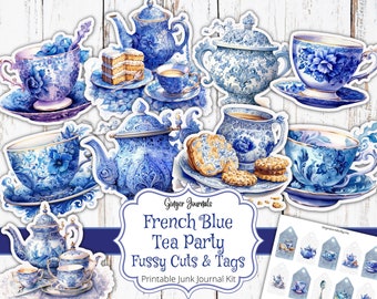 May include: A printable junk journal kit featuring blue and white teacups, teapots, and sugar bowls with intricate floral patterns. The kit includes fussy cuts and tags with the text "French Blue Tea Party Fussy Cuts & Tags".