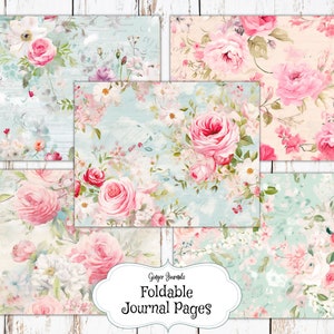 May include: Five printable journal pages with a floral pattern featuring pink roses, white flowers, and green leaves on a light blue background with a distressed wood texture. The text "Ginger Journals Foldable Journal Pages" is in a white oval frame.