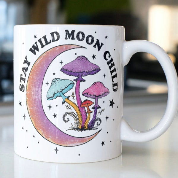 Vintage hippie mug with a crescent moon and mushrooms stating,"Stay Wild Moon Child"