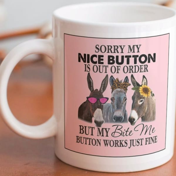 Funny Horse/Donkey coffee mug stating “Sorry my nice button is out of order, but my bite me button works just fine”