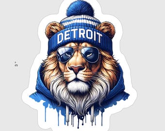 May include: A blue and white beanie with the word "DETROIT" on it is worn by a lion with a blue hoodie. The lion is wearing sunglasses and has a serious expression.