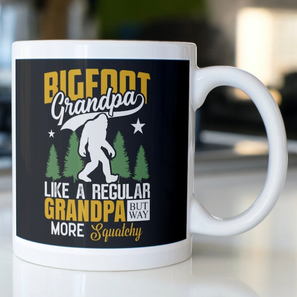 Funny Bigfoot Grandpa coffee mug stating,"BIGFOOT Grandpa Like A Regular GRANDPA But Way More Squatchy"