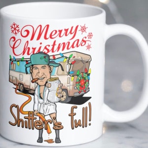 Funny Christmas Vacation cousin Eddie scene coffee mug stating”Shitter&#39;s Full&quot;