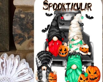 Halloween Gnomes Sign stating, "Spooktacular".