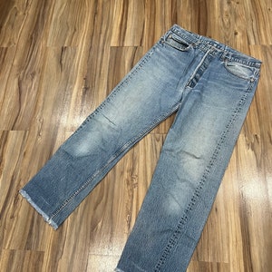 34x30 Vintage 90s Levi’s 501 Light Wash Cotton Denim Distressed Jeans Fabricado nos EUA