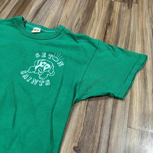 Small Vintage 70s Russell Athletic Green Seton Saints Dog Halo Graphic T Shirt USA Made