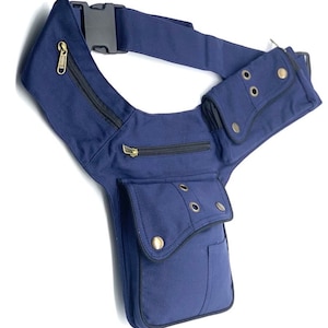 May include: A dark blue canvas fanny pack with multiple pockets and a zipper closure. The pack has a wide adjustable belt with a buckle closure.