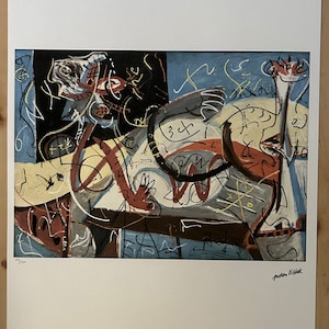 May include: Abstract art print featuring a colorful, chaotic composition with black, white, red, yellow, blue, and brown paint. The print includes a stylized animal figure and scribbled lines and numbers. The print is signed "Arthur Piatk" in the bottom right corner.