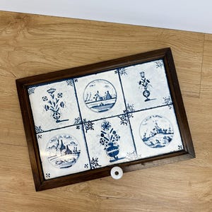 May include: A set of three ceramic mugs with a speckled, matte finish. The mugs are in shades of cream, light gray, and dark gray. Each mug has a simple, minimalist design, perfect for coffee or tea.