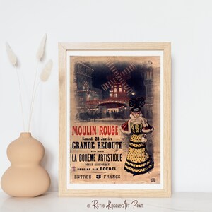 May include: A vintage poster advertising the Moulin Rouge in Paris, France. The poster features a woman in a yellow and black polka dot dress, a red and white fur coat, and a black hat. The poster also features a windmill and the text "Moulin Rouge, Samedi 23 Janvier, Grande Redoute, La Boheme Artistique, Mere Allegorie, Dessine par Roedel, Entree: 3 Francs".