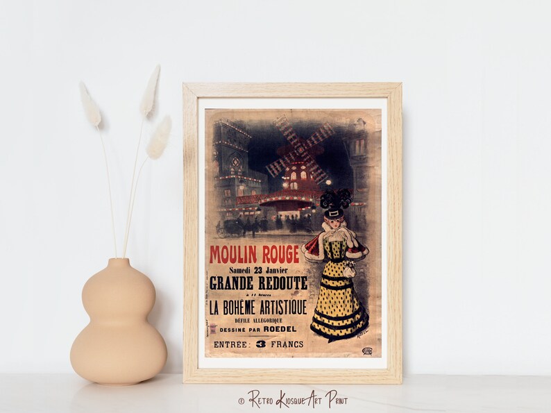 May include: A vintage poster advertising the Moulin Rouge in Paris, France. The poster features a woman in a yellow and black polka dot dress, a red and white fur coat, and a black hat. The poster also features a windmill and the text "Moulin Rouge, Samedi 23 Janvier, Grande Redoute, La Boheme Artistique, Mere Allegorie, Dessine par Roedel, Entree: 3 Francs".