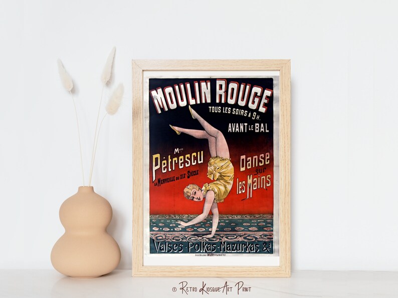 May include: A vintage poster for the Moulin Rouge in Paris, France. The poster features a woman in a yellow and black costume performing a handstand. The text on the poster reads "Moulin Rouge", "Tous les Soirs a 9h", "Avant le Bal", "M. Petrescu", "La Merveille du XX Siecle", "Danse sur les Mains", and "Valses Polkas Mazurkas &".