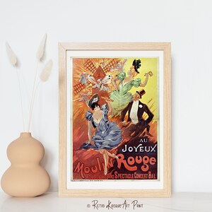 May include: A vintage poster advertising the Moulin Rouge in Paris, France. The poster features a windmill, dancers, and the text "Au Joyeux Moulin Rouge Tous les Soirs Spectacle Concert Bal".