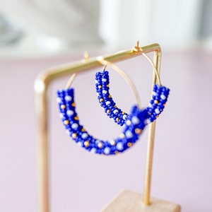 Beaded blue hoops Handmade beaded earrings Irregular earrings Unique designer jewelry huggie hoop indigenous beadwork
