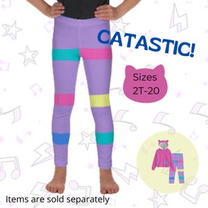 Könnte beinhalten: Lilafarbene Leggings mit bunten Streifen, mit einem pinkfarbenen, gelben, blauen und türkisfarbenen Design. Die Leggings werden an einem Kindermodell gezeigt. Der Text "CATASTIC!" und "Sizes 2T-20" ist ebenfalls auf dem Bild zu sehen.