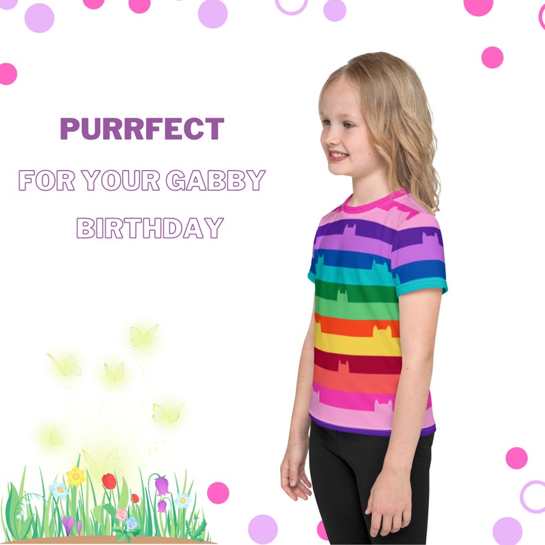 May include: A girl wearing a pink and rainbow striped t-shirt with a cat silhouette design. The shirt has the text "PURRFECT FOR YOUR GABBY BIRTHDAY" on a white background.