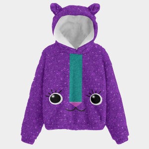 May include: A purple hooded sweatshirt with a cat face design. The sweatshirt features a glittery texture, a teal stripe down the front, and a white-lined hood with cat ears. The cat face includes large black eyes, eyelashes, and a pink nose.