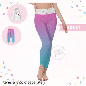 May include: Adult leggings with a pink to teal gradient design. The waistband features a pattern of colourful sprinkles. Additional images show a matching hoodie and pants set. The text "ADULT" is visible.