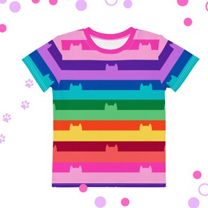 May include: A colorful rainbow striped t-shirt with a silhouette of a cat on each stripe. The shirt is pink, purple, blue, green, yellow, orange, and red.