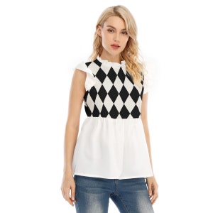 May include: A white sleeveless top with a black and white diamond pattern on the bodice and a white ruffle collar. The top has a white ruffle trim on the sleeves and a white peplum hem.