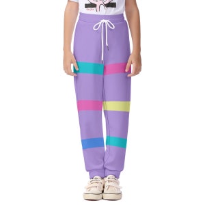May include: Purple sweatpants with colourful horizontal stripes. The sweatpants have a drawstring waist and a relaxed fit.