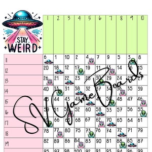 May include: A pink and green bingo card with numbers 1 to 100. The card has a UFO, alien, and unicorn graphic on each square. The card has the text "Stay Weird" at the top and "SV Game Boards" at the bottom.