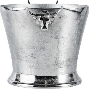 May include: Silver ice bucket with a bull head design on the handle.