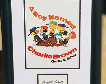 Charles M. Schultz: “A Boy Named Charlie Brown”, Autograph, with included Print, Framed