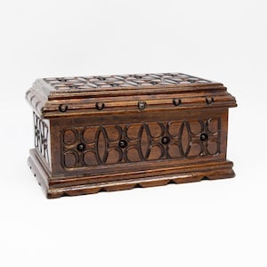 May include: A set of three ceramic mugs with a speckled, matte finish. The mugs are in shades of cream, light gray, and dark gray. Each mug has a simple, minimalist design and a rounded handle.