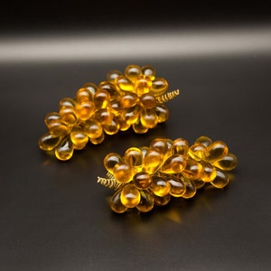 Two Crystal Grape Bunches that Transmit Beautiful Gold Light for on a Cabinet or on a Table also Ideal as an Interior Gift