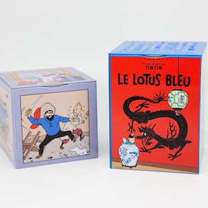 Two Boxes of Tintin with Milou and Captain Haddock in Vibrant Colors by Hergé Perfect Gift for a Tintin Collector or Comic Book Fanatic
