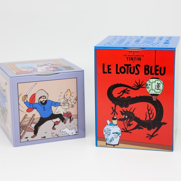 Deux boîtes de Tintin avec Milou et le Capitaine Haddock aux couleurs vives par Hergé Cadeau parfait pour un collectionneur de Tintin ou un fanatique de bandes dessinées