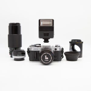 Canon AE-1 SLR Camera with matching carrying case and Two Lenses Flash and Angle-Scope Made in Japan Around 1980 Ideal as Photographer Gift