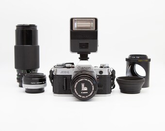Canon AE-1 SLR Camera W/ Lenses, Flash, Case - 1980 Olympic