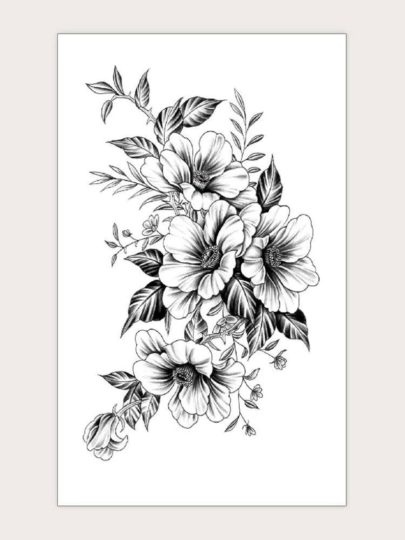 May include: Black and white line art tattoo design of a bouquet of flowers. The flowers are stylized and have a delicate, feminine look.