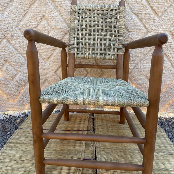 Handwoven Moroccan chair, Grid pattern, Accent chair, with a dark brown frame and light brown woven backrest and seat, Arabastta
