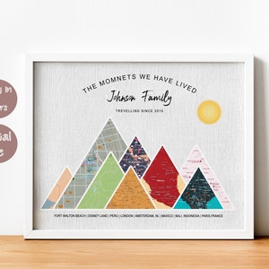May include: A printable digital art print featuring a mountain range made of maps of different cities. The text "THE MOMENTS WE HAVE LIVED Johnson Family TRAVELLING SINCE 2010" is at the top of the print. The cities listed at the bottom of the print are Fort Walton Beach, Disney Land, Peru, London, Amsterdam, NL, Mexico, Bali, Indonesia, Paris, France.