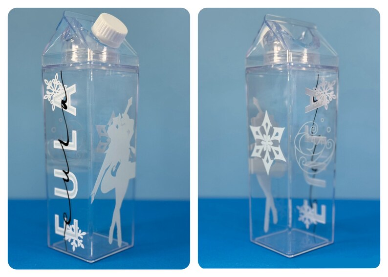 May include: Clear plastic water bottle shaped like a milk carton, with a white cap. The bottle features white snowflake and character designs, along with the word "FULA" in white script. The bottle is on a blue background.