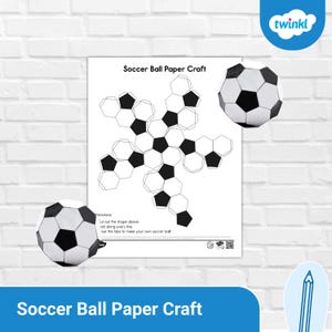 May include: A printable Soccer Ball Paper Craft sheet featuring a black and white hexagonal pattern template, instructions for cutting, folding, and gluing, and two completed three-dimensional paper soccer balls positioned on the page.